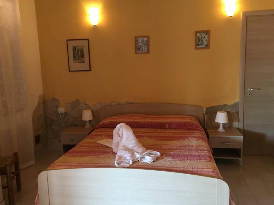 Postel nebo postele na pokoji v ubytování Hotel Villaggio Stromboli