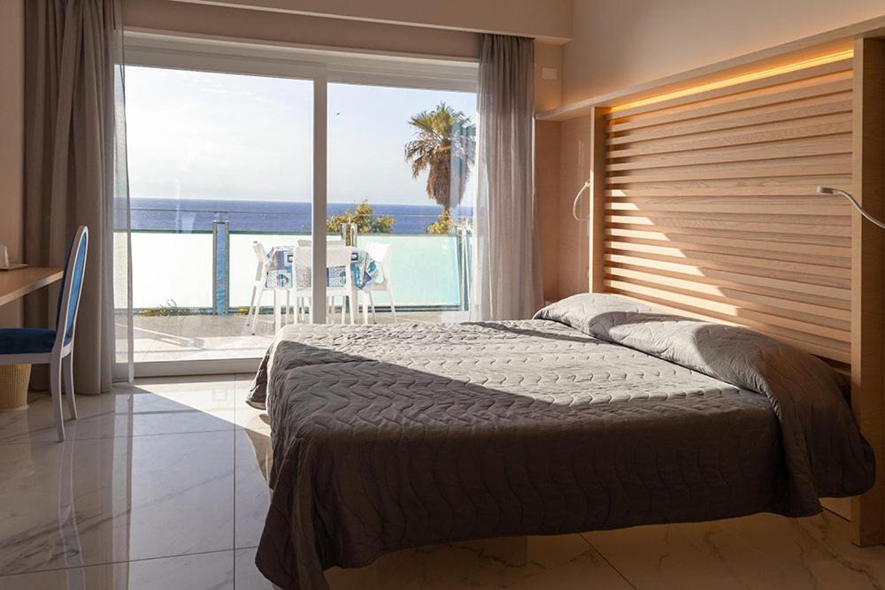 Postel nebo postele na pokoji v ubytování Hotel Villaggio Stromboli