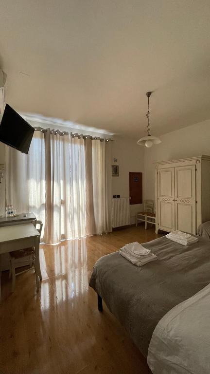 Posteľ alebo postele v izbe v ubytovaní La Spiga Affittacamere