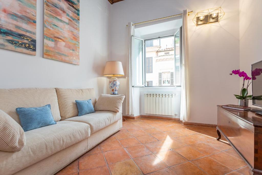 A seating area at Barberini 3 BDR Apartment