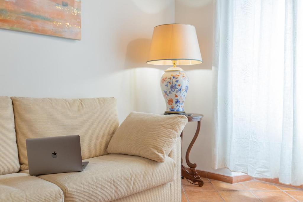 A seating area at Barberini 3 BDR Apartment