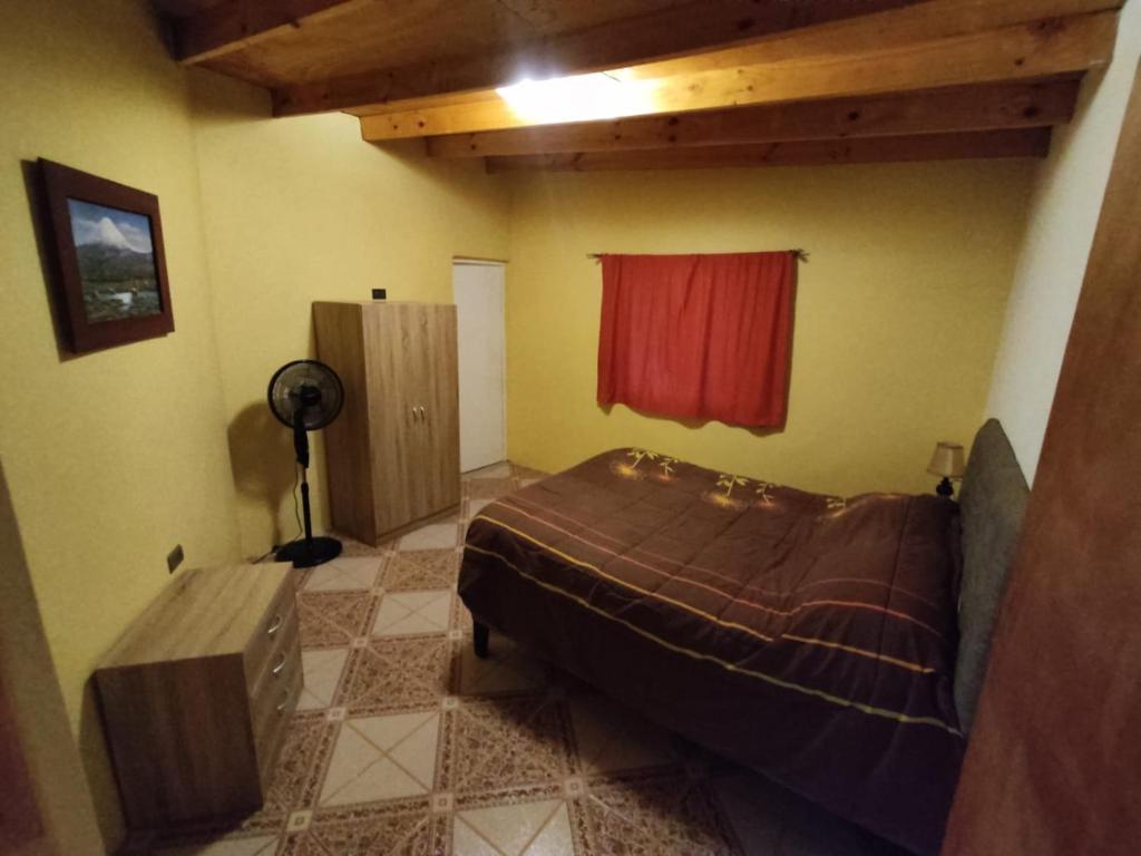 Postel nebo postele na pokoji v ubytování Cabañas Larache
