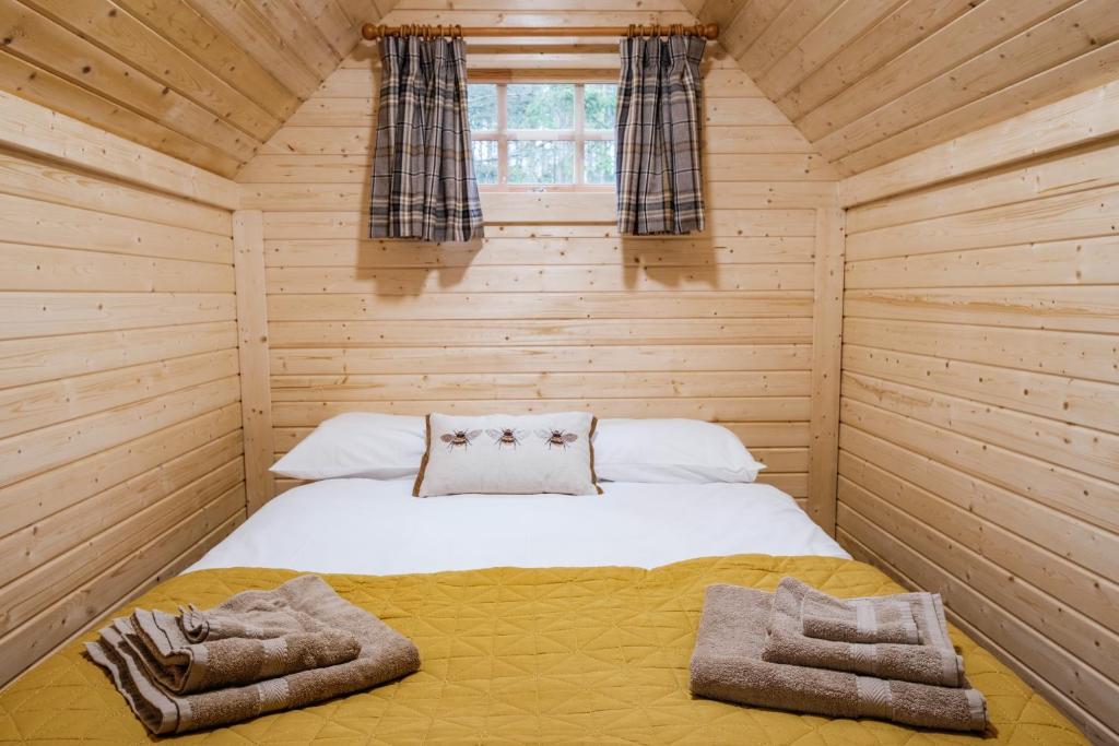 Postel nebo postele na pokoji v ubytování Cairngorm Bothies