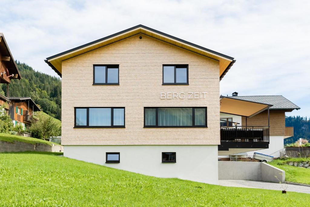 a house with the word breach written on it at BergZeit Schoppernau in Schoppernau