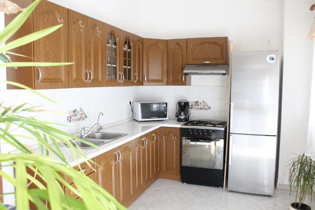 Kuchyňa alebo kuchynka v ubytovaní Apartment Fuma