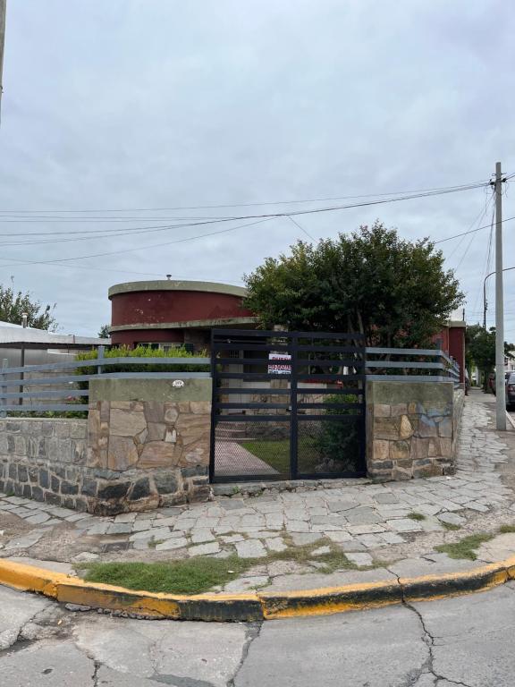 an entrance to a building with a gate at Alojamiento en La Falda - MSL in La Falda