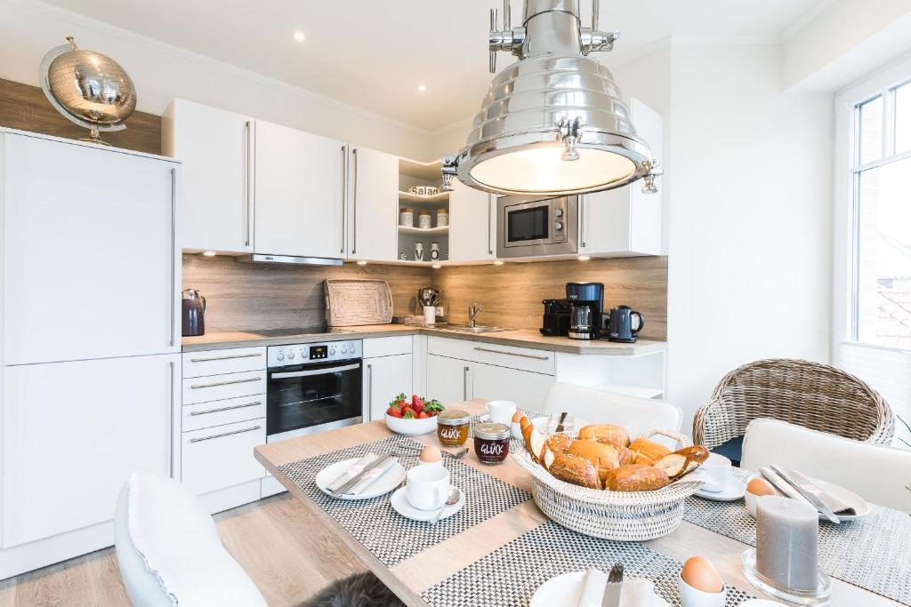 Kuchyň nebo kuchyňský kout v ubytování Strandvilla Apartment Meeresglück