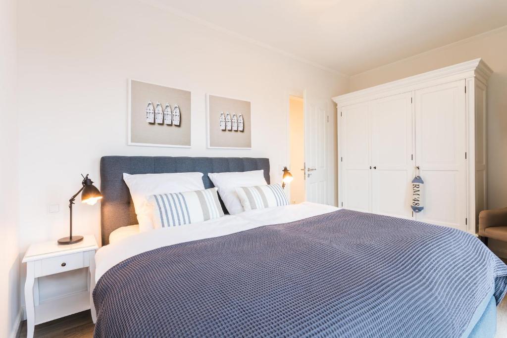 Postel nebo postele na pokoji v ubytování Strandvilla Apartment Meeresglück