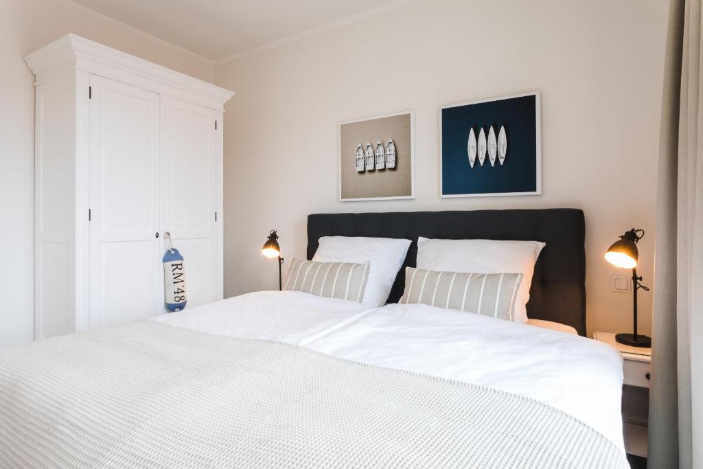 Postel nebo postele na pokoji v ubytování Strandvilla Apartment Meeresglück