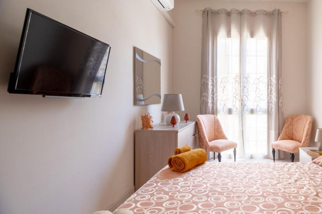 TV a/nebo společenská místnost v ubytování A casa tua Affitti brevi