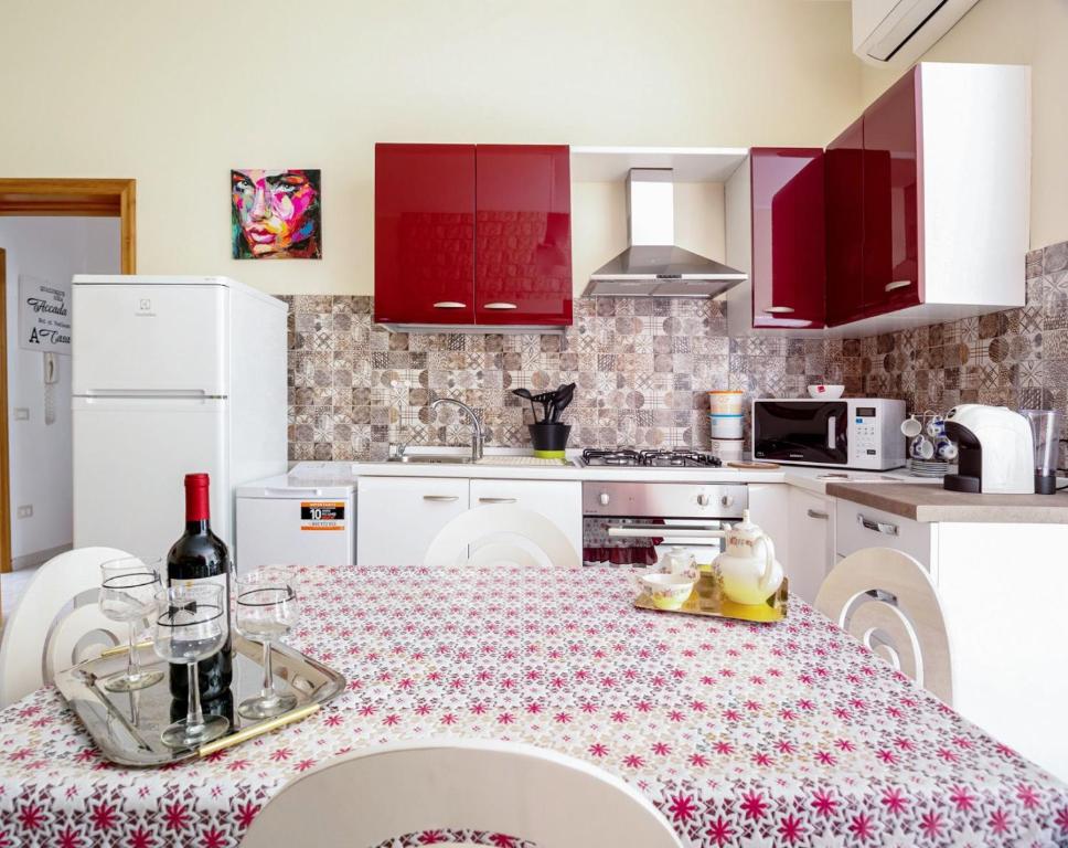 Kuchyň nebo kuchyňský kout v ubytování A casa tua Affitti brevi