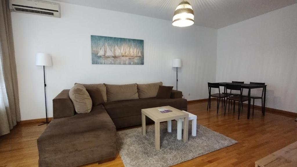 Posezení v ubytování Apartment Belville, Suncokret 26