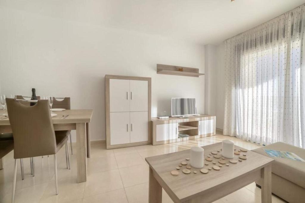Televízia a/alebo spoločenská miestnosť v ubytovaní Apartamento Cuellar 1 - PlusHolidays