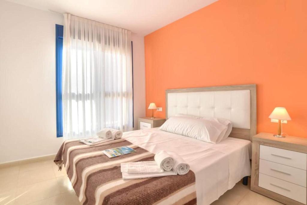 Posteľ alebo postele v izbe v ubytovaní Apartamento Cuellar 1 - PlusHolidays