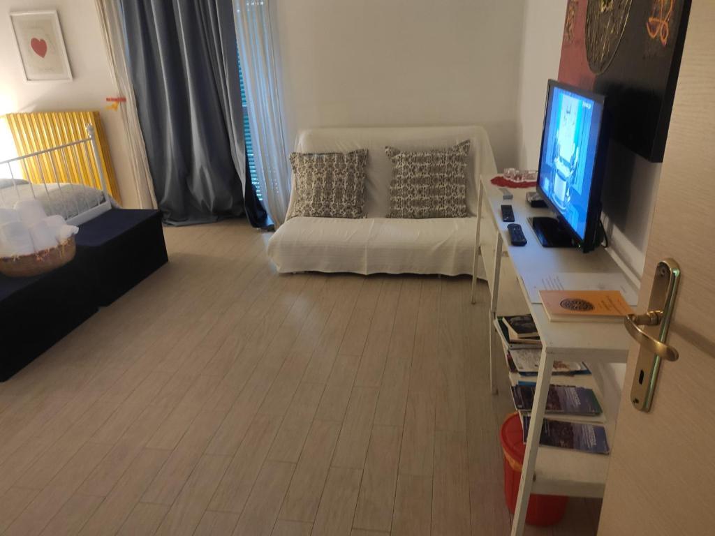 Postel nebo postele na pokoji v ubytování Terrazza Sui Sassi