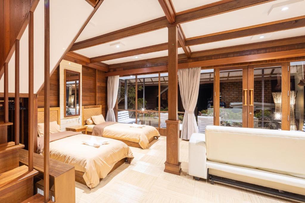 Postel nebo postele na pokoji v ubytování Sienna Resort