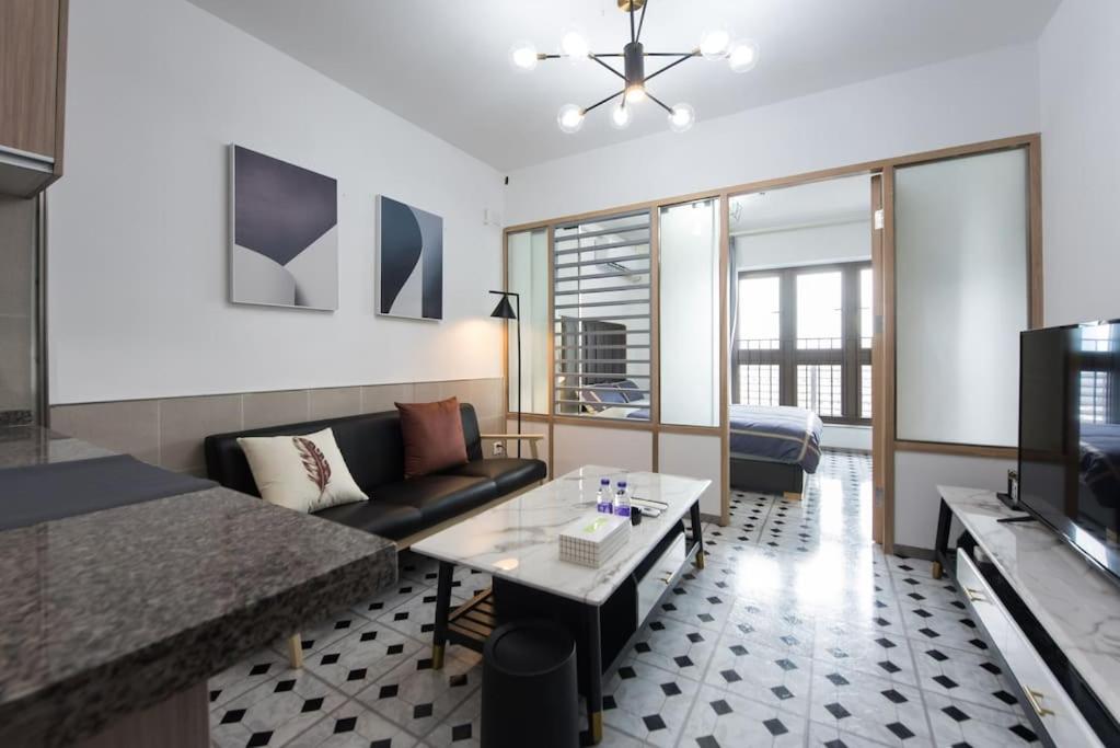 Posezení v ubytování WESU Weisu Executive Apartment Shenzhen Shenda Metro Store
