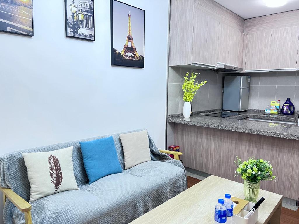 Posezení v ubytování WESU Weisu Executive Apartment Shenzhen Shenda Metro Store