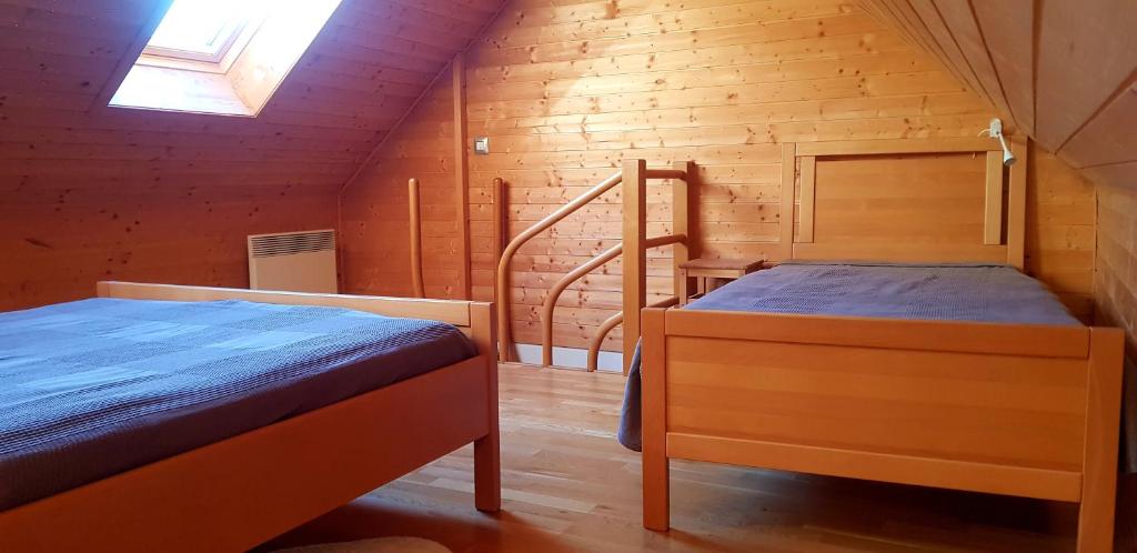 Postel nebo postele na pokoji v ubytování Mountain peaks Apartment with Sauna