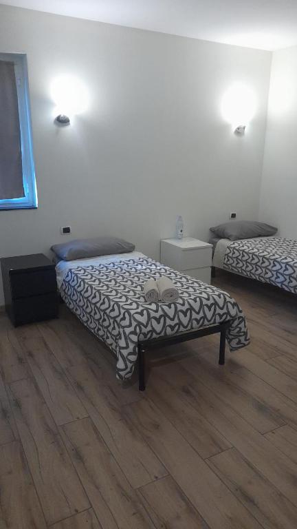 Postel nebo postele na pokoji v ubytování La Quiete