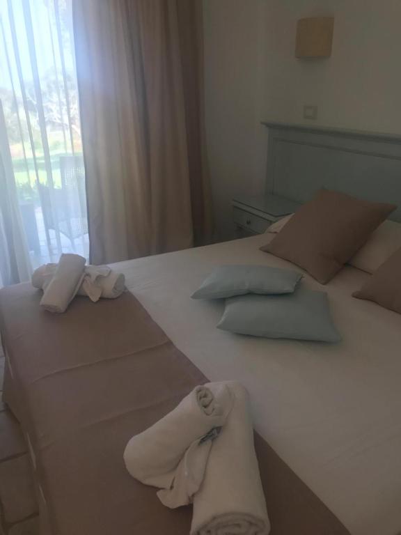 Postel nebo postele na pokoji v ubytování B&B La Vigna