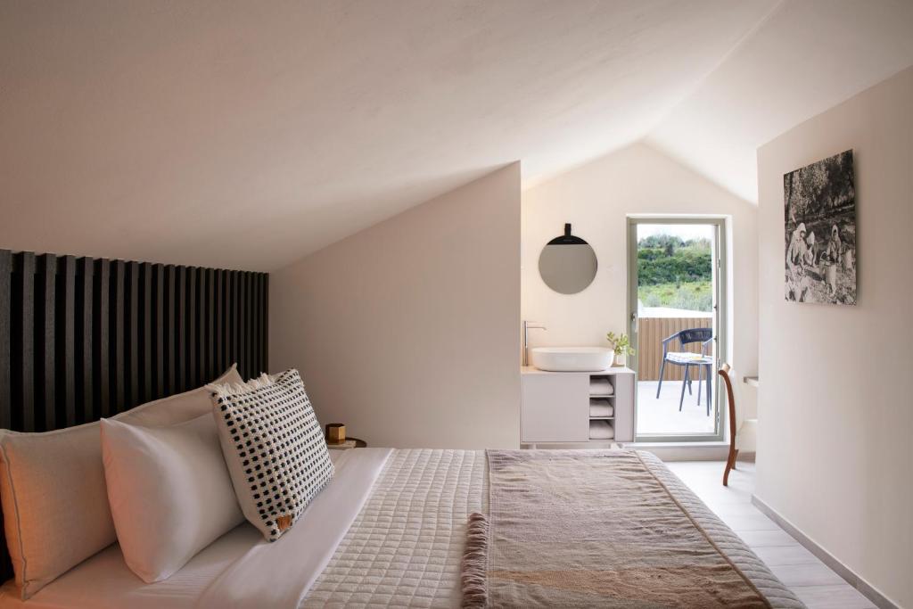 Postel nebo postele na pokoji v ubytování Arbora Olea Luxury Resort