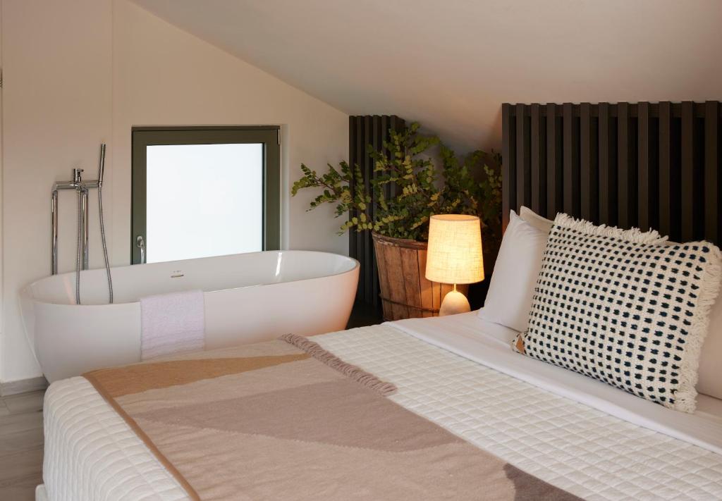 Postel nebo postele na pokoji v ubytování Arbora Olea Luxury Resort