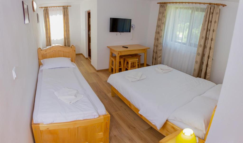 Booking.com: Pensiunea Alpina 1 , Rucăr, România . Rezervaţi la hotel acum!