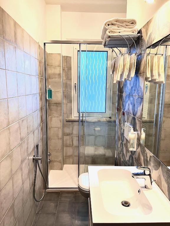 Koupelna v ubytování Albergo Di Murlo