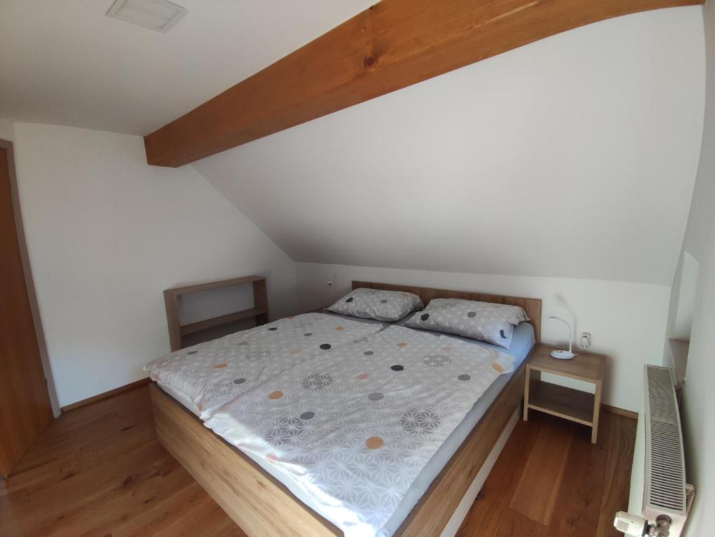 Postel nebo postele na pokoji v ubytování Apartmaji Mojca