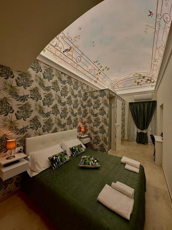 Postel nebo postele na pokoji v ubytování M.Mansion