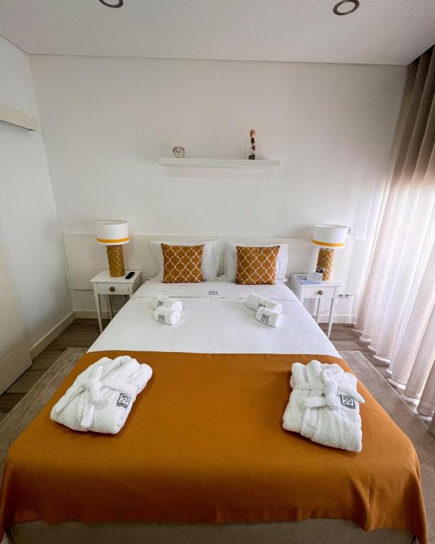 Postel nebo postele na pokoji v ubytování Pátio 29 - Guest House