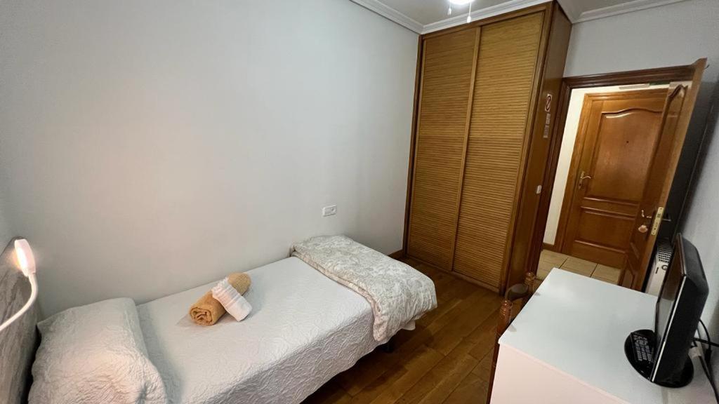Postel nebo postele na pokoji v ubytování Pensión Buen Camino