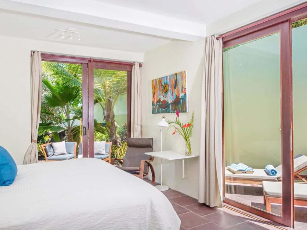 Postel nebo postele na pokoji v ubytování 473 Grenada Boutique Resort