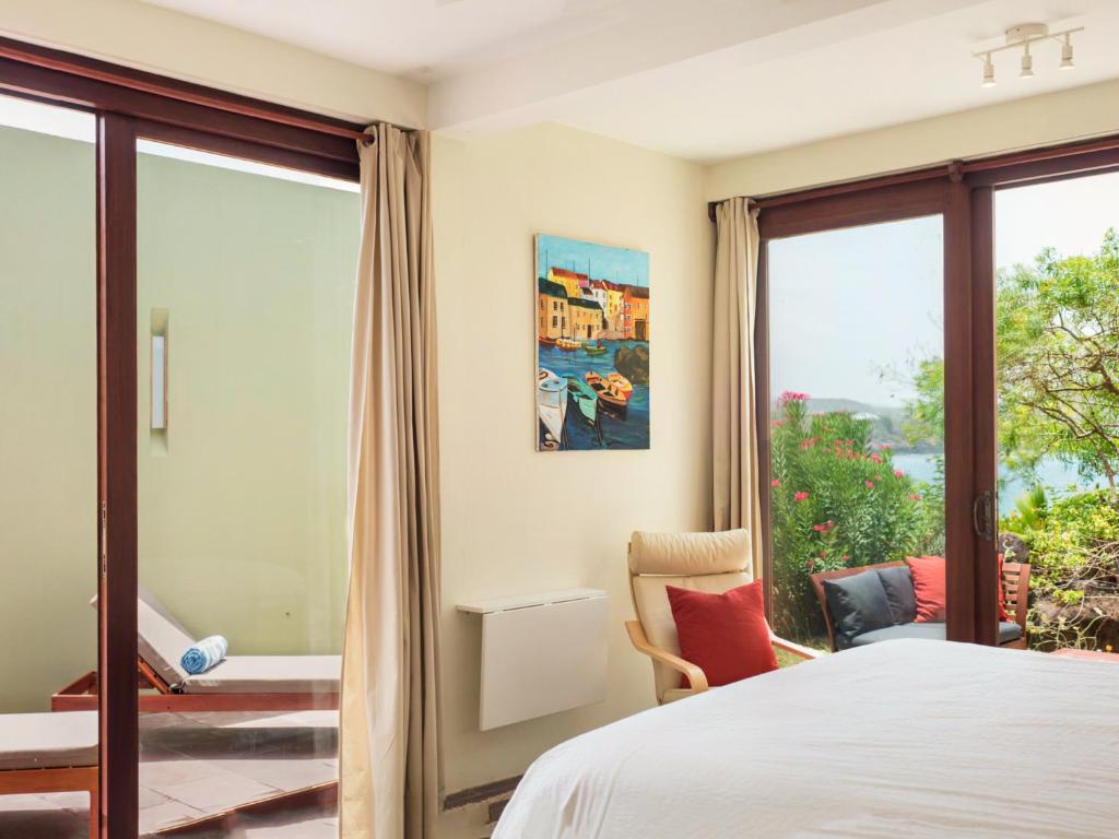 Postel nebo postele na pokoji v ubytování 473 Grenada Boutique Resort