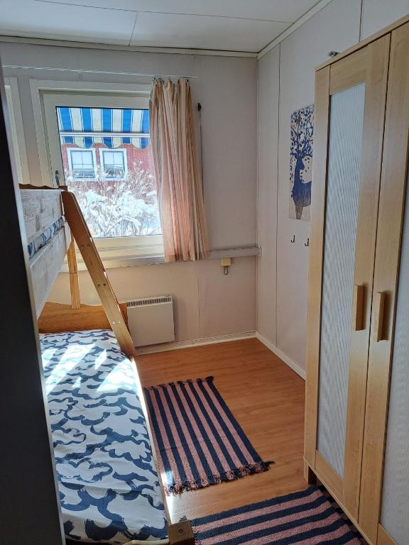 Postel nebo postele na pokoji v ubytování Långrösta 48-49, Appartementen in Hagfors