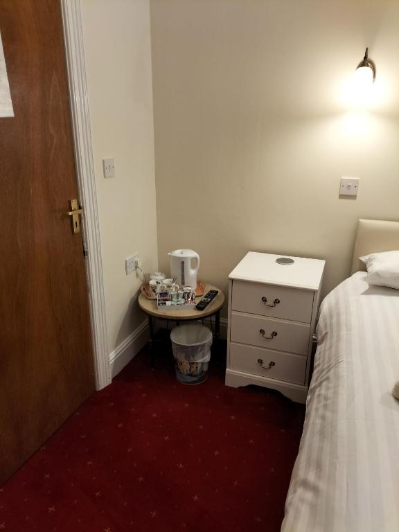 Postel nebo postele na pokoji v ubytování Viking Hotel