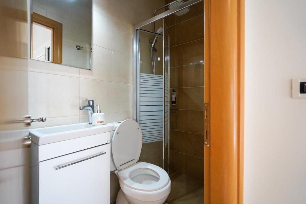 Kúpeľňa v ubytovaní Kyriakos Apartment