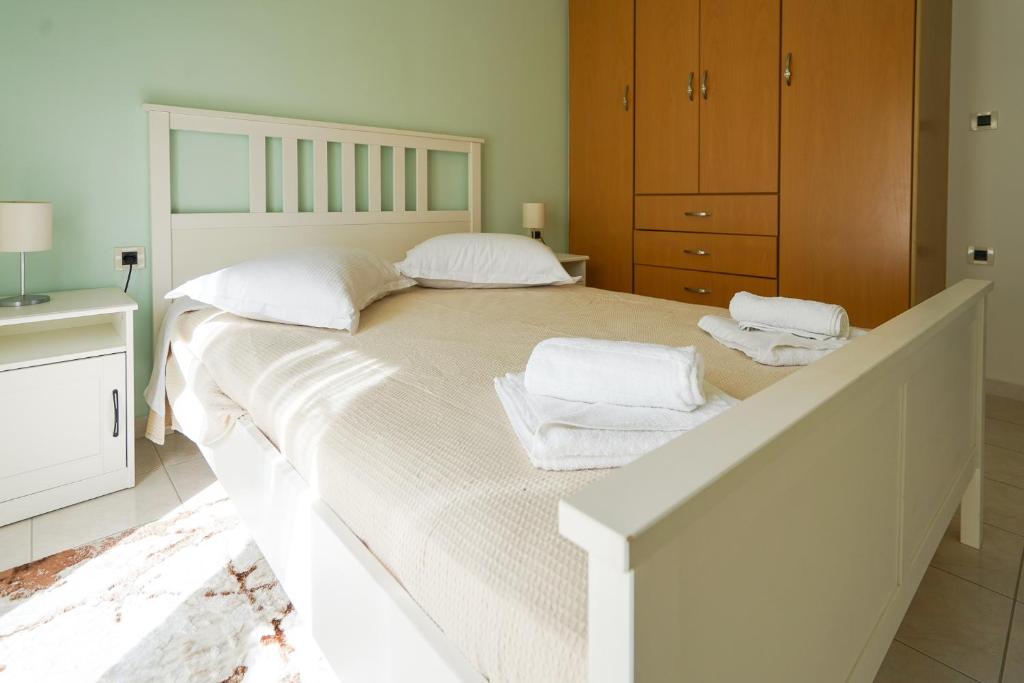 Posteľ alebo postele v izbe v ubytovaní Kyriakos Apartment