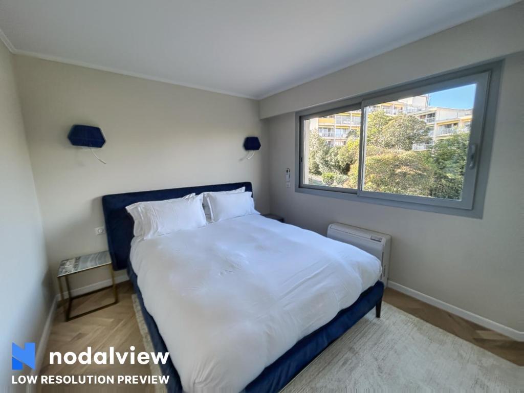 Posteľ alebo postele v izbe v ubytovaní Cannes Appartement 3 pièces vue mer