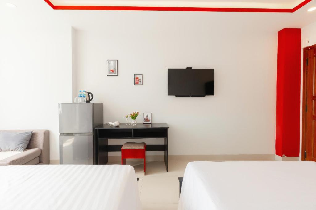 Postelja oz. postelje v sobi nastanitve KEVIN HOTEL