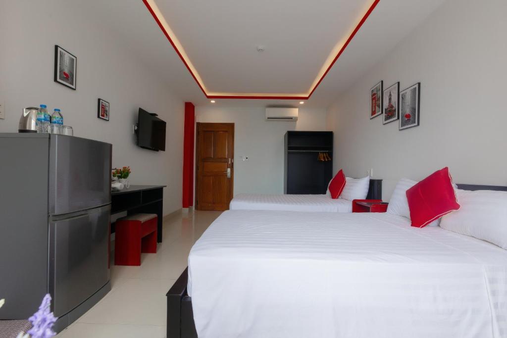 Postelja oz. postelje v sobi nastanitve KEVIN HOTEL