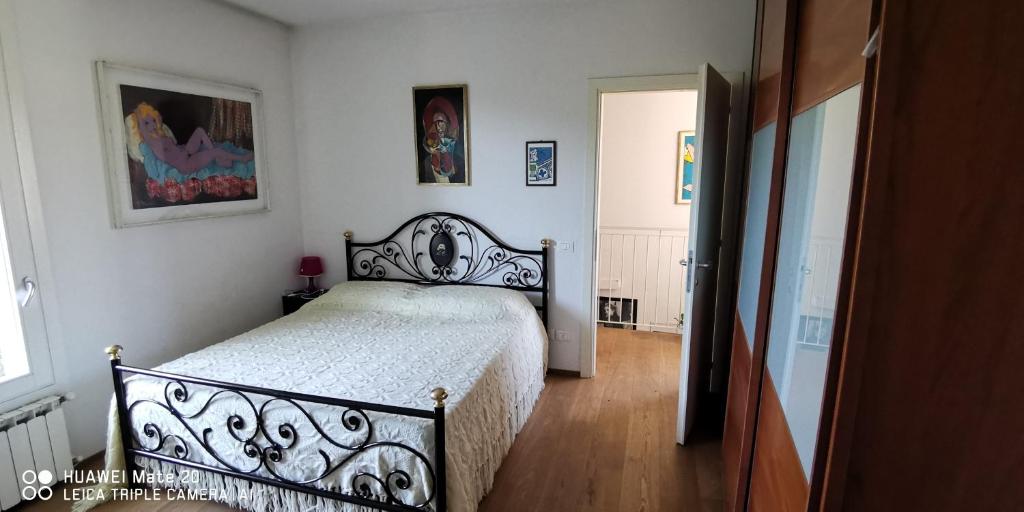 Ένα ή περισσότερα κρεβάτια σε δωμάτιο στο Casa Anna