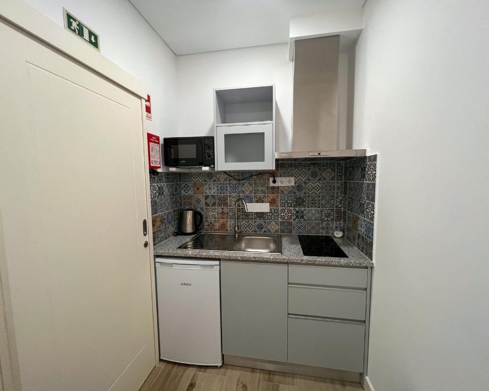 Kuchyň nebo kuchyňský kout v ubytování Pátio 29 - Guest House