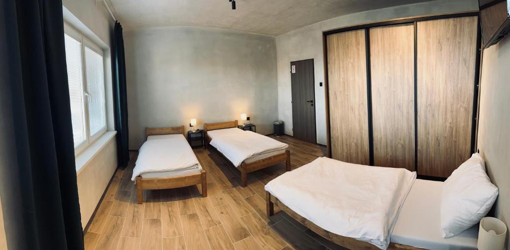 A bed or beds in a room at Kerkira pub&restaurant