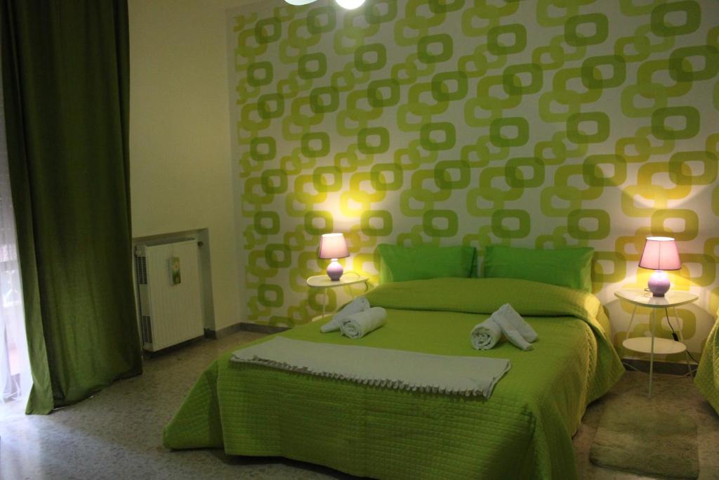 Postel nebo postele na pokoji v ubytování B&B Dietro l'Angolo