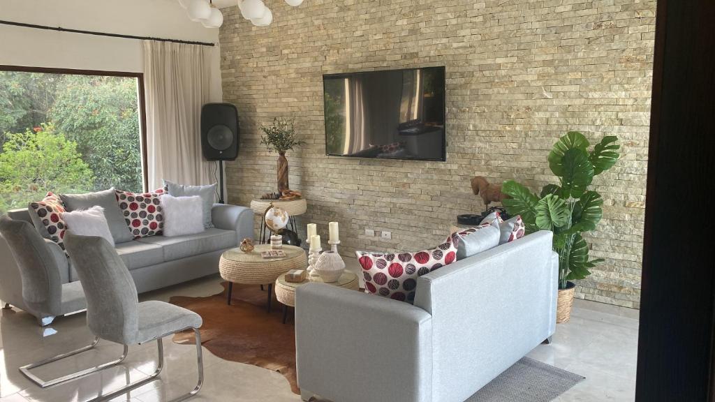 Posezení v ubytování Villa Mónaco Jarabacoa RD