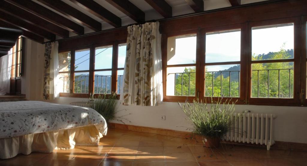 Postel nebo postele na pokoji v ubytování Sa Vall Valldemossa