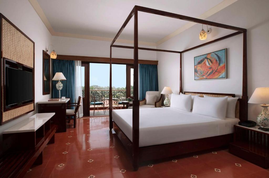 Postel nebo postele na pokoji v ubytování Radisson Blu Resort, Goa