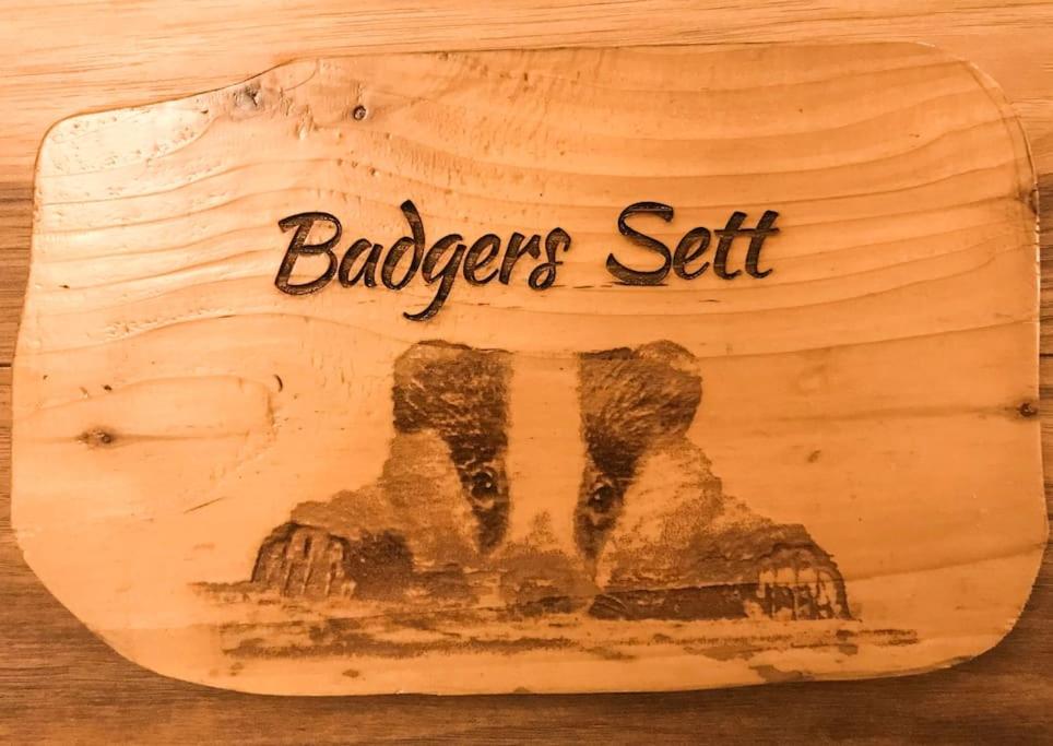 a wooden box with the words baggers set on it at Badgers Sett 2 Bedroom sleeps 4, The New Inn Viney Hill, Forest of Dean in Blakeney